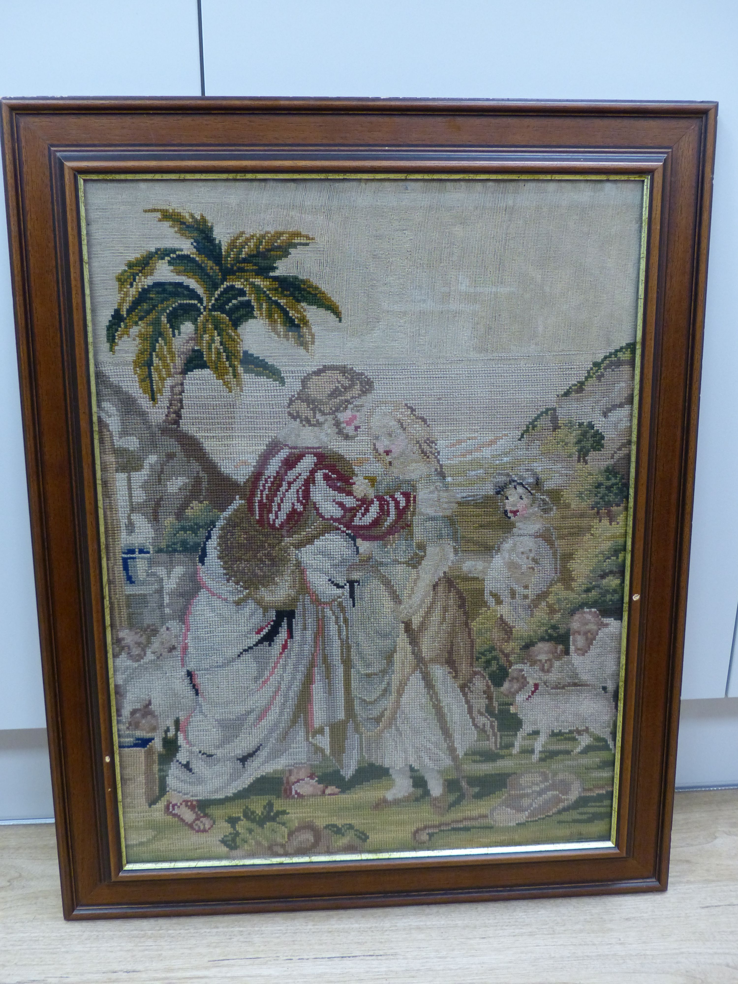 A Victorian woolwork picture depicting Rebecca at the well, framed, 59 x 45cm excl. frame